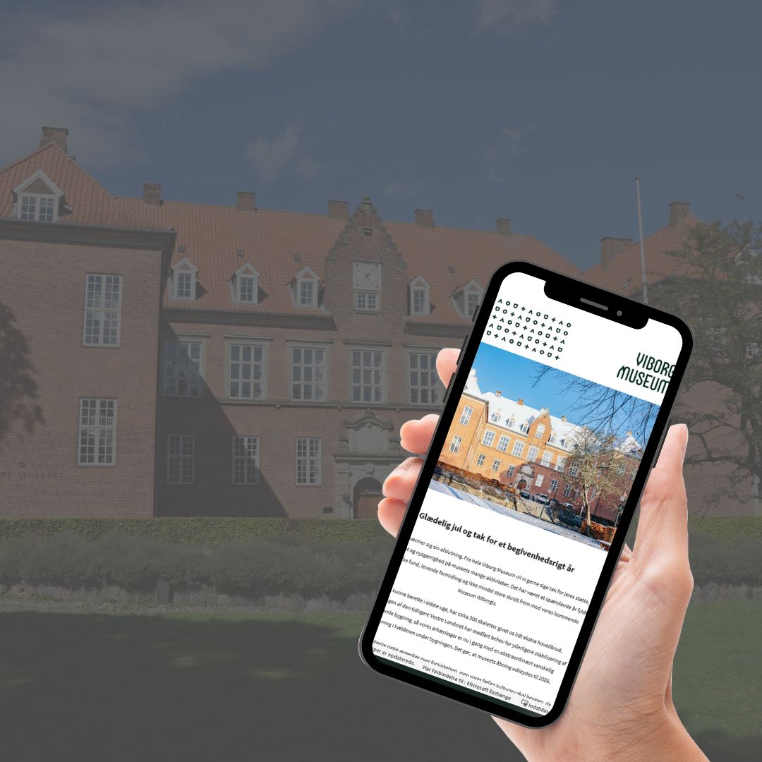 Tilmeld nyhedsbrev_hånd med mobil.jpg